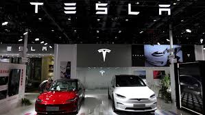 IMPACT OF TESLA ON ELECTRIC VEHICLE MARKET